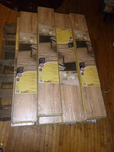 lot 99 image: 11 Boxes of Traffic Master Laminate Flooring