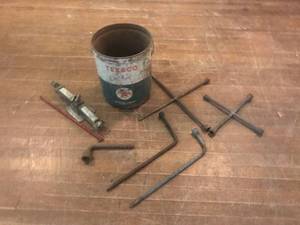 lot 41 image: Tire Irons, Jack & Old Texaco Can