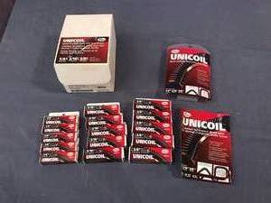 lot 72 image: Box of Unicoil  Hose Benders