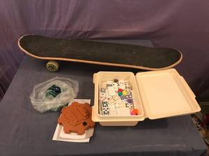 lot 178 image: Skateboard, Dominos & Marbles