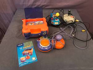 lot 185 image: V Smile Learning System & TV Games