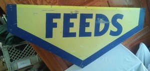 Feeds Metal Sign.