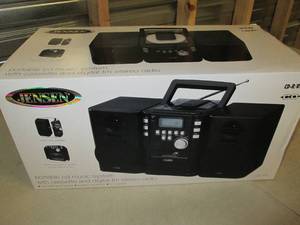 lot 16 image: jensen portable cd music system wit...