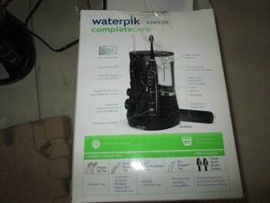 lot 27 image: waterpik sonic 5.0 complete care ...