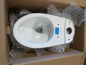 lot 29 image: TOTO Drake ADA Compliant 1-Piece 1.6 GPF Single Flush Elongated Toilet in Cotton White, Seat Not Included