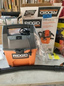 lot 123 image: RIDGID 3 Gal. 3.5-Peak HP Portable WetDry Shop Vacuum with Built-in Dust Pan, Filter, Expandable Hose and Car Nozzle