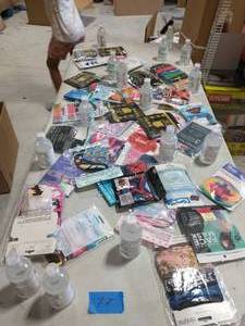 lot 77 image: LOT OF MIXED FACE MASKS AND HAND SANITIZER