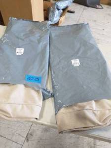 lot 100 image: HAMPTONB BAY BEIGE SLIPCOVERS