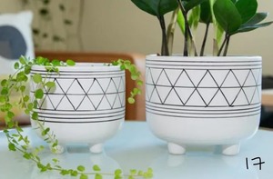 lot 17 image: 6 in. and 5 in. WhiteBlack Ceramic Line Geometric with Legs Mid-Century Planter (Set of 2)