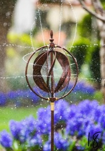 lot 18 image: Copper Sphere 48 in. Hydro Kinetic Wind Spinner