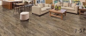 lot 150 image: TRAFFIC MASTERS Saratoga Hickory Amber 7 mm Thick x 7-23 in. Wide x 50-58 in. Length Laminate Flooring (24.17 sq. ft.  case)