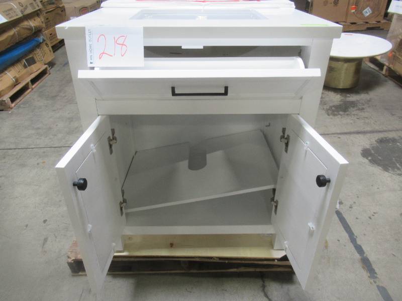 lot 209 image: Marksfield 30 in. W x 22 in. D Bath Vanity in White with Cultured Stone Vanity Top in White with White Basin - Cracked Top, Brocken RH Back Leg.