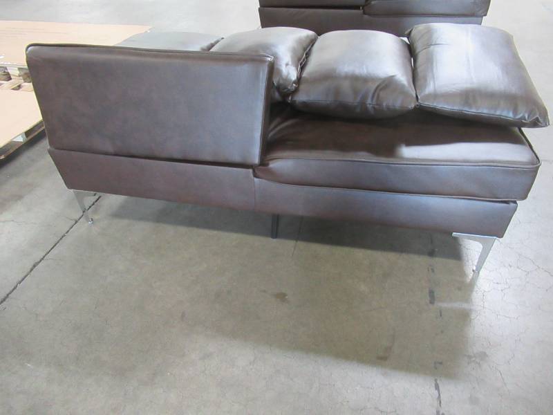 lot 101 image: Chaise Part of Sofa - Missing 1 Backrest, includes 4 pillows - For parts.