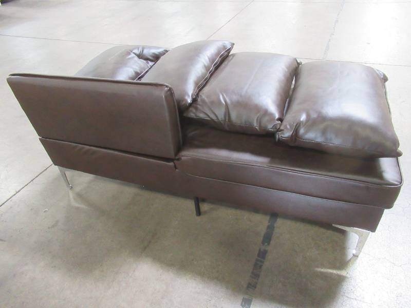 lot 102 image: Chaise Part of Sofa - Missing 1 Backrest, includes 4 pillows - For parts.