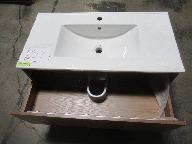 lot 208 image: 36 X 19 Floating Vanity in Brown. 1 drawer, bottom shelf, missing hardware - Scratch and Dent.
