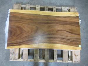 lot 76 image: Solid Wood Live Edge Walnut Coffee Table (48251960) Approximate Dimensions 48 in. x 25 in. x 2.25 in.