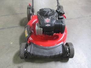 lot 15 image: Troy-bilt 21 in. 140 cc 500e Series Briggs & Stratton Gas Walk Behind Push Mower with 2-in-1 Cutting TriAction Cutting System TB100