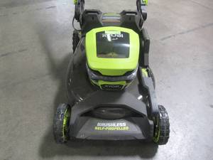 lot 31 image: Ryobi 21 in. 40-Volt Brushless Lithium-Ion Cordless SMART TREK SelfPropelled Walk Behind Mower RY40LM10-2B