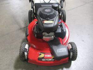 lot 36 image: Toro 22 in. Honda High Wheel Variable Speed Gas Walk Behind Self Propelled Lawn Mower 20379