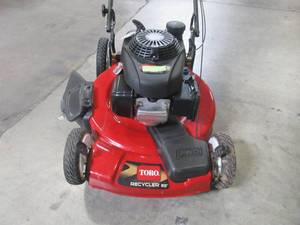 lot 41 image: Toro 22 in. Honda High Wheel Variable Speed Gas Walk Behind Self Propelled Lawn Mower 20379