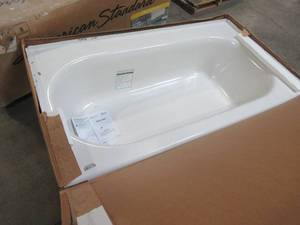 lot 523 image: American Standard Princeton Luxury Ledge 5 ft. Americast Left Hand Drain Bathtub in White.