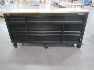 lot 1A image: Husky 72 in. 18-Drawer Mobile Workbench with Adjustable-Height Solid Wood Top in Matte Black, HOLC7218BB1MYS - NEW  (slight ding on Top) LOW RESERVE OF $750.00