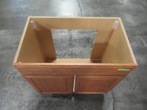 lot 320 image: Design House 30 in. x 18 in. x 33 in. 2-Door Bath Vanity in Honey Oak 592998