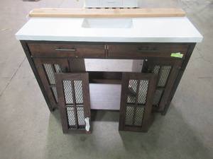 lot 542 image: Drysdale 48 in. Wx 34.5 in. H Bath Vanity in Sable with Engineered Stone Vanity Top in Lgt Vein Carrera with White Basin - Doors are damaged, Top is cracked. - For partsrestore.