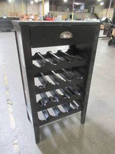 lot 128 image: Powell Company 16-Bottle Black Floor Wine Rack. - Scratch and Dent (Paint peeled on LH Side).