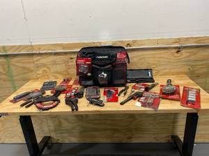 lot 67 image: HUSKY 16 in. Large Mouth Tool Bag with Tool Wall Filled with Husky Tools