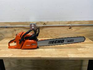 lot 11 image: ECHO 24 in. 59.8 cc Gas 2-Stroke Cycle Chainsaw