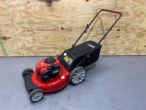 lot 105 image: TROY-BILT 21 in. 140cc 550ex Series Briggs & Stratton Engine 2-in-1 Gas Walk Behind Push Lawn Mower with High Rear Wheels