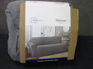 lot 2 image: Sofa Slipcover...