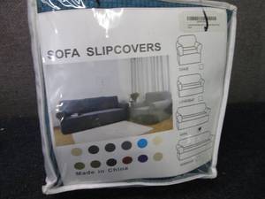 lot 5 image: Sofa Slipcover...