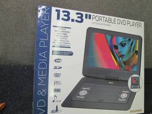 lot 137 image: Sylvania 13.3 inch Portable DVD Pla...