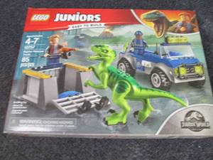 lot 174 image: Legos Juniors Raptor Rescue Truck...