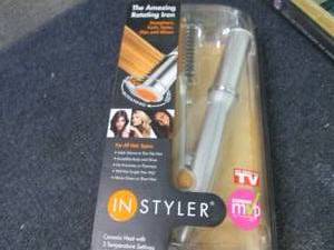 lot 195 image: InStyler Rotating Iron...