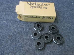 lot 218 image: 6 Weedeater Spools...