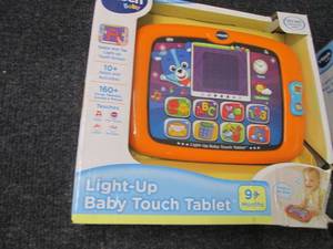 lot 255 image: V-Tech Light-Up Baby Touch Tablet...