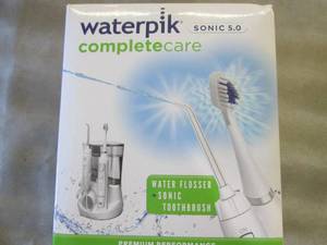 lot 293 image: Waterpik Oral Care System open box ...