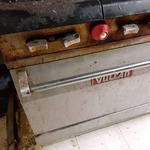 Vulcan 10 burner commercial gas stove with oven.  60 wide, 32 deep