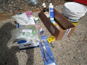 lot 202 image: Dewormer, Syringes, Needles