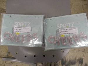 lot 33 image: Spritz Cheers balloons with twine...