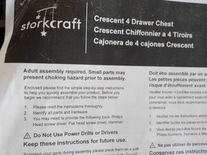 lot 101 image: Storkcraft Crescent 4 drawer chest ...