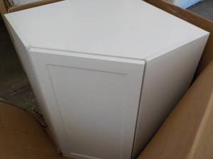 lot 102 image: Home Depot diagonal wall white cabi...