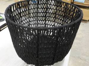 lot 47 image: black woven basket 18 diameter x 14...