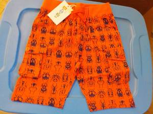 lot 173 image: Coyote and Co. orange shorts 5 size...
