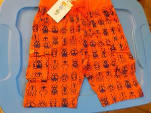 lot 174 image: Coyote and Co. orange shorts 10 siz...