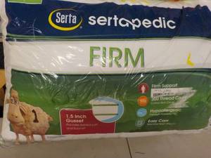 lot 204 image: Serta Firm pillow...