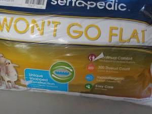lot 205 image: Serta Wont Go Flat pillow...